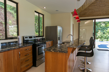 The beautiful kitchen and breakfast bar