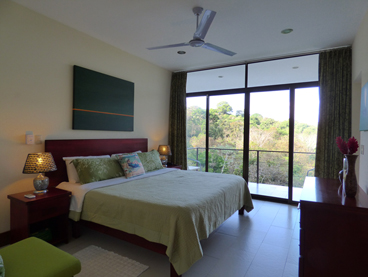 Green room and private balcony with jungle view