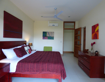 Dramatic red room and private balcony